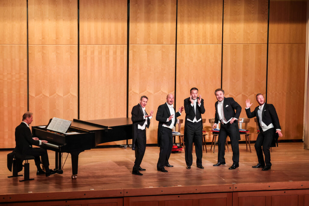 Vocal performance on a concert stage.